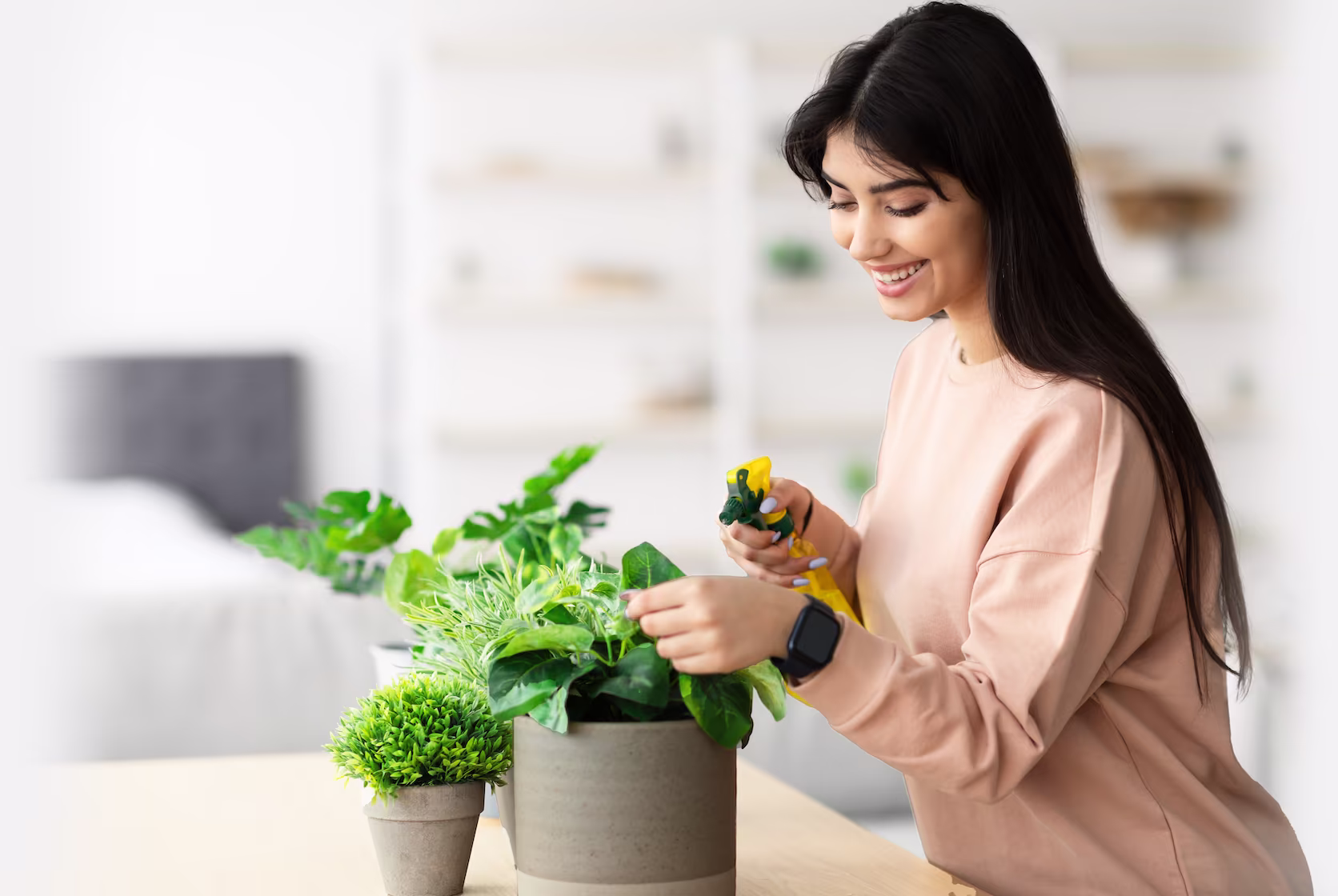 Housesitter watering plants